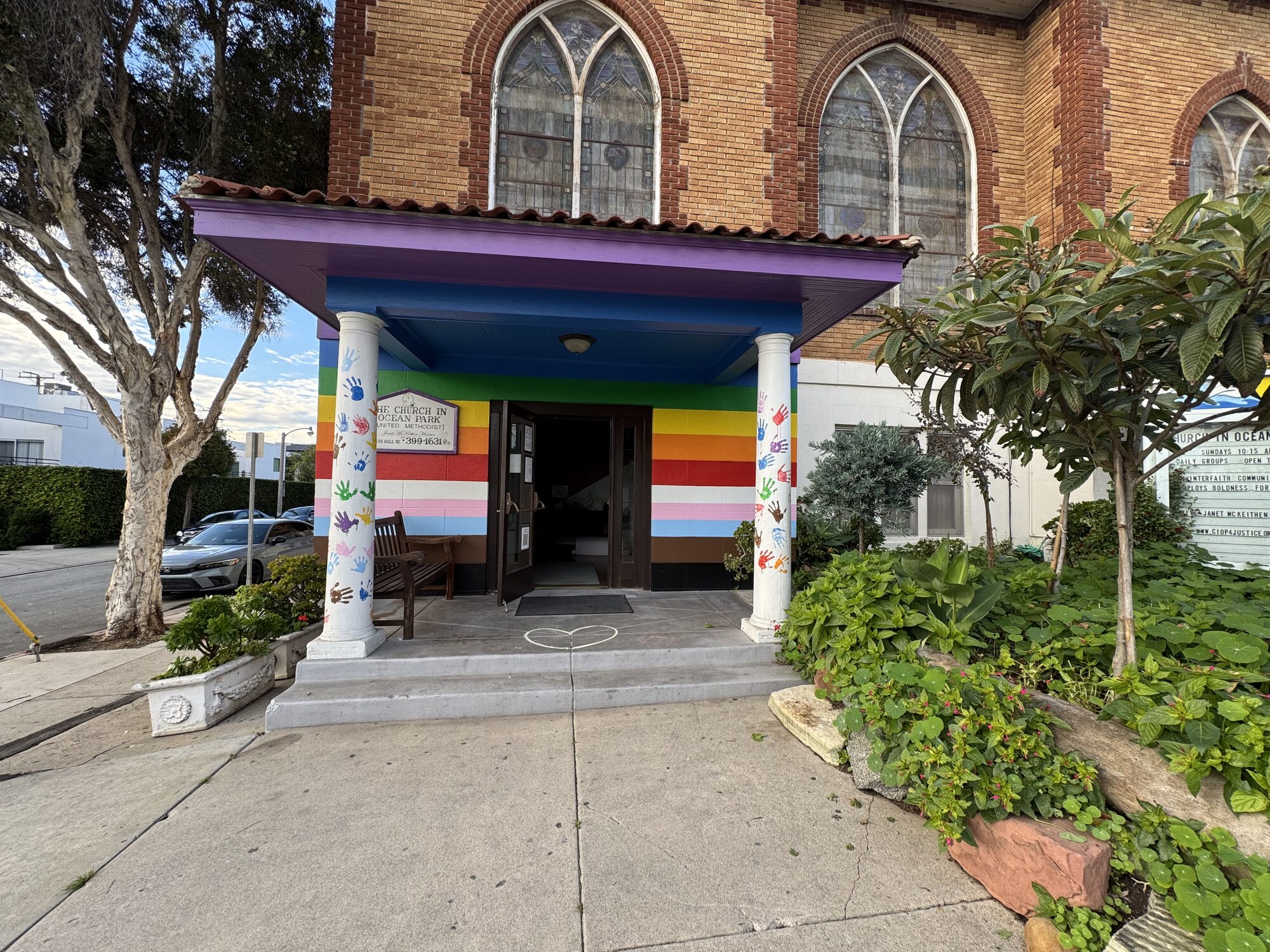 Church in Ocean Park front entrance surrounded by a colorful garden