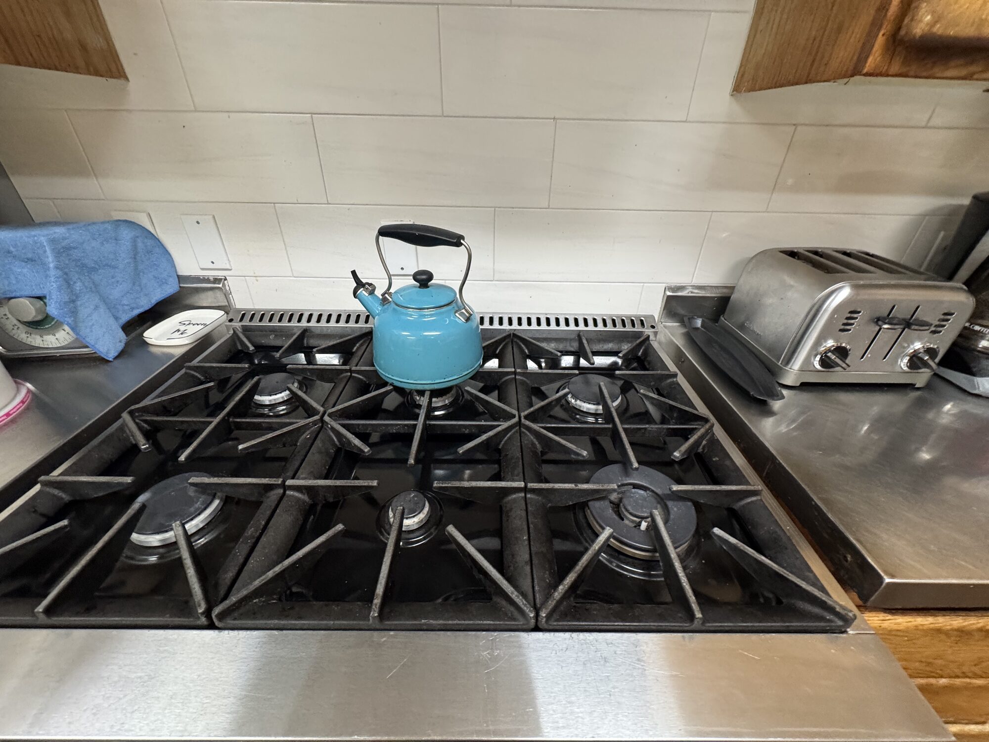 Six-burner range in the event kitchen